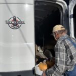 Safe Harbor loading up their truck with food